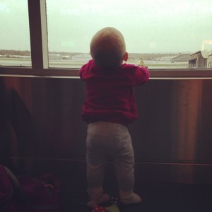 Isla watching the planes taking off in 2012.
