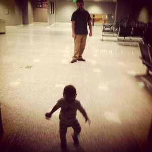 Isla running through the Austin airport in 2013